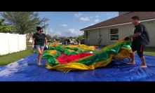 Roll up the water slide with a machine
