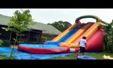 Deflate and roll up the 18 feet tall water slide