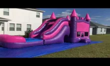 Pink and purple bounce house water slide combo